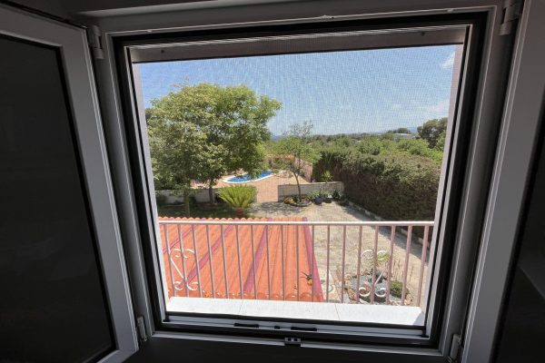 Mosquitera enrollable para ventana