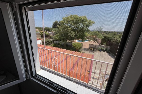 Mosquitera enrollable para ventana